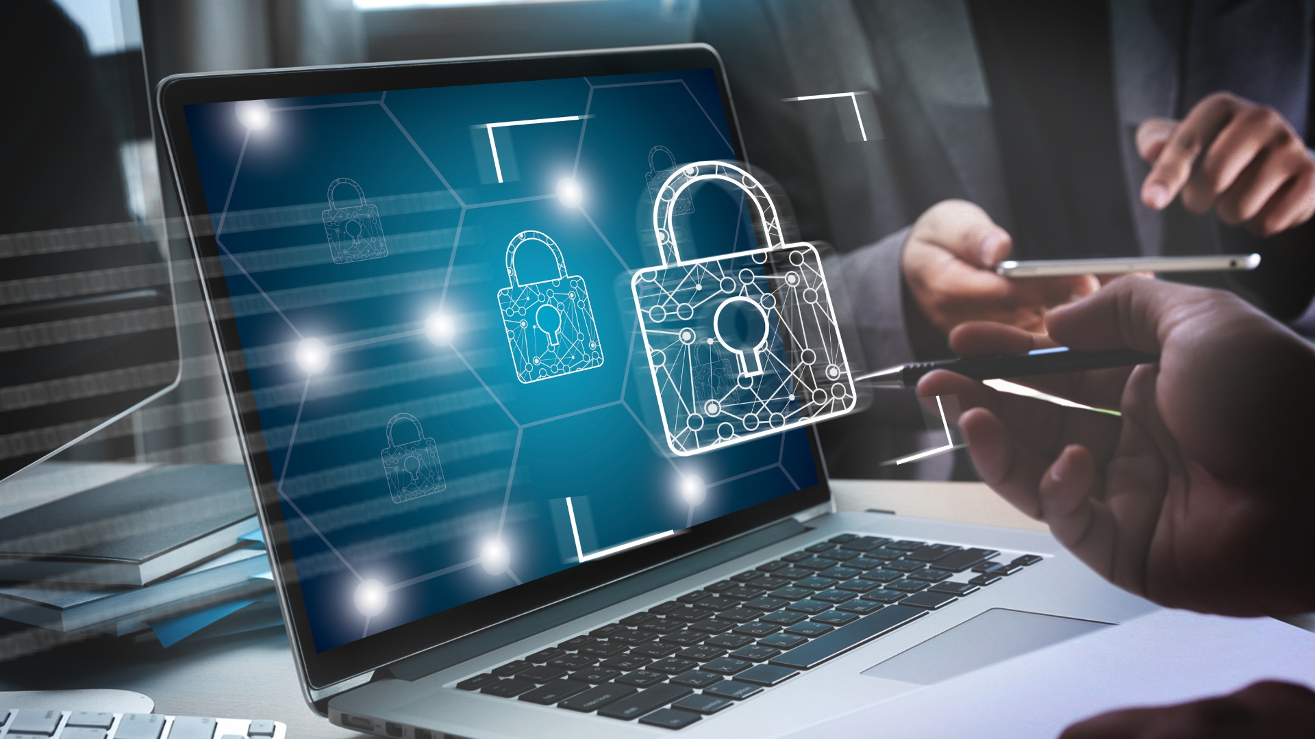 Laptop with glowing lock icons representing secure digital communications.